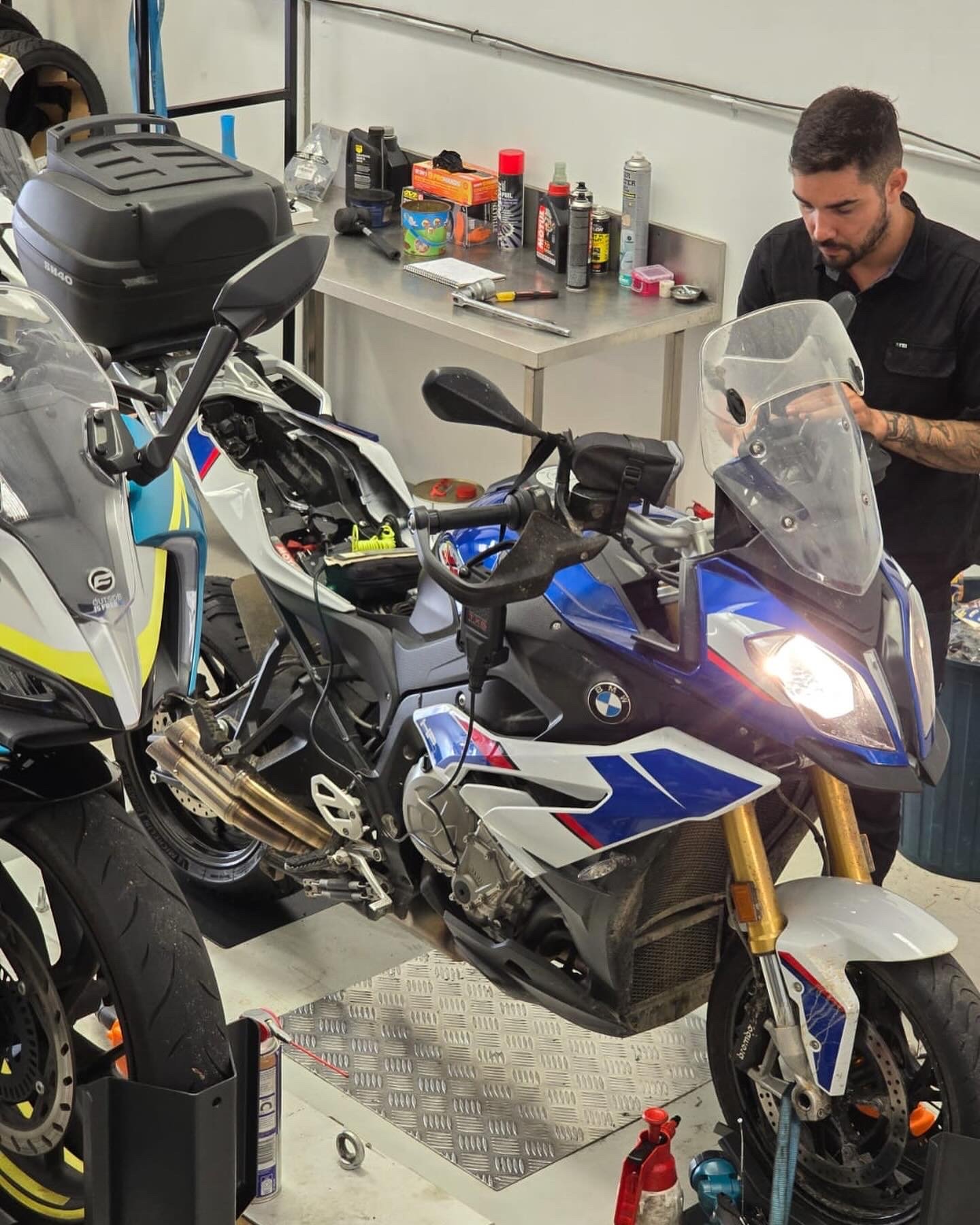 Victor working on a BMW in the Motopro workshop